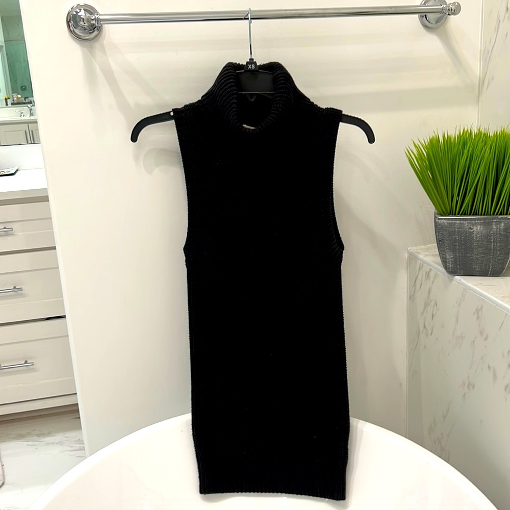 Black sleeveless turtleneck